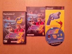 Jogo com caixa, manual e papelada. Também tenho uma G-Con 2 em caixa, embora não esteja na foto.